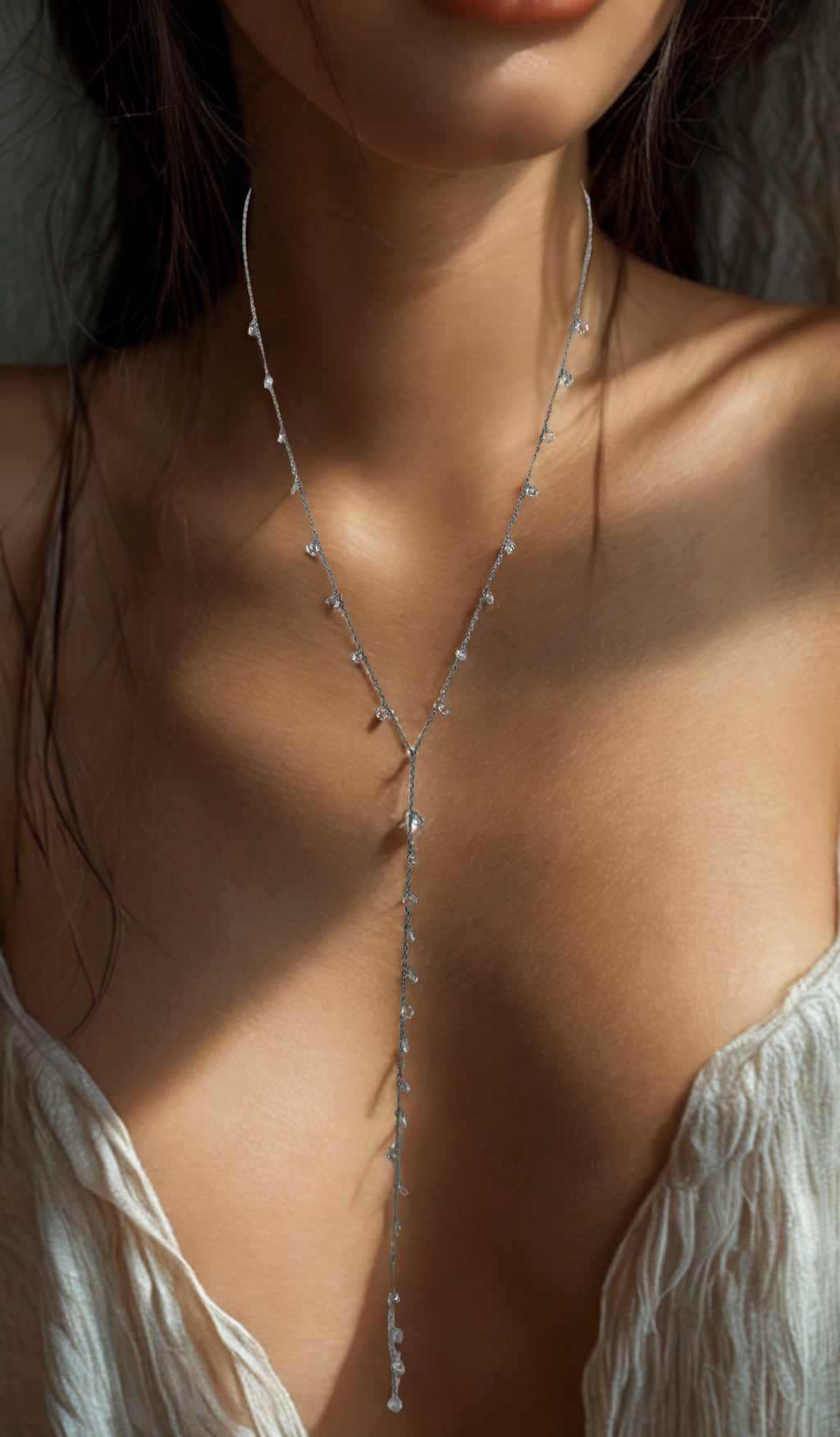 Be Je’s silver Y-shaped diamond necklace with delicate drop detail.