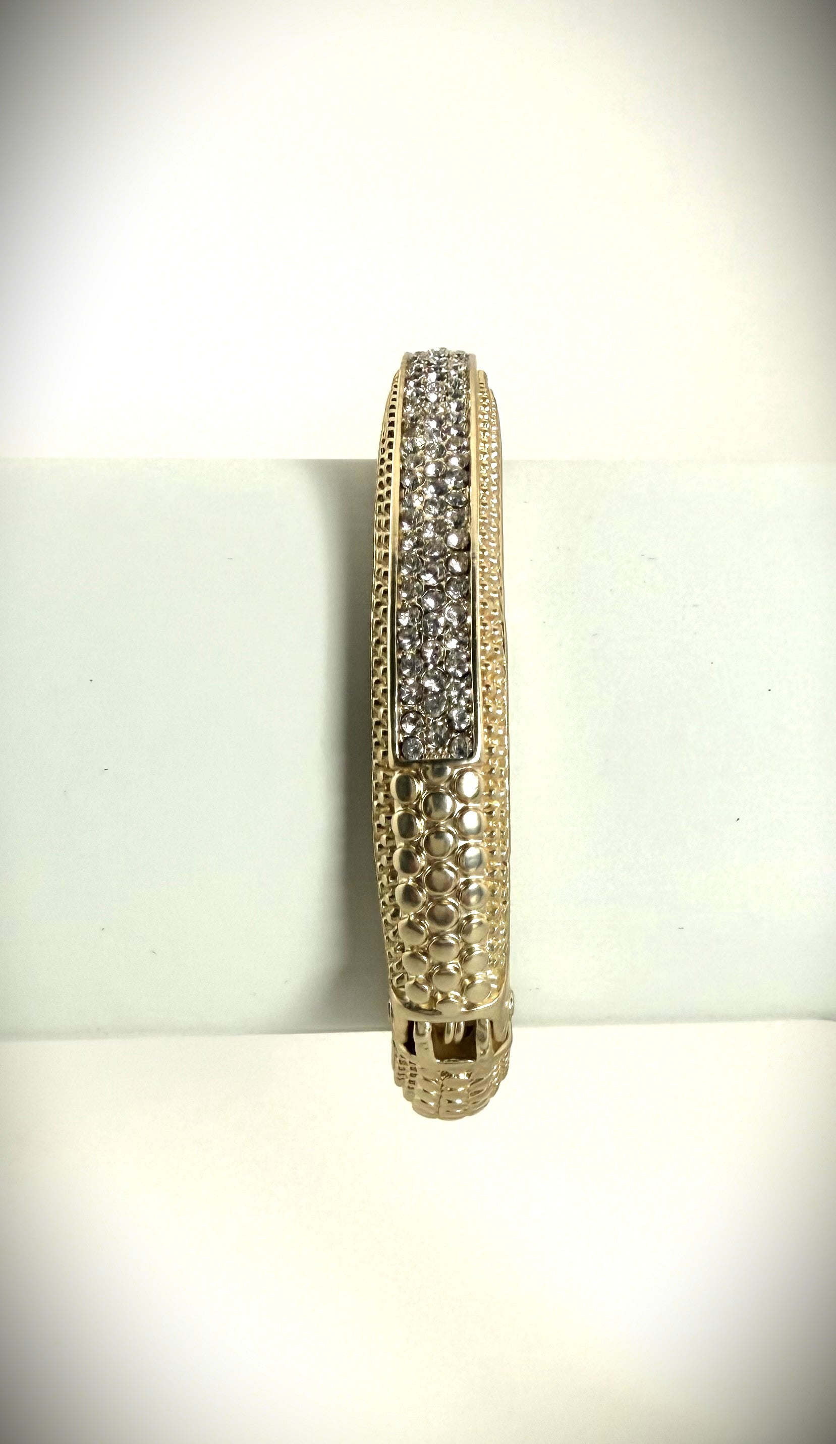 Gold stackable bracelet with pavé diamonds, fine luxury jewelry.