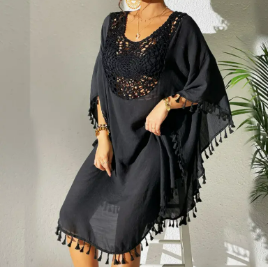 Black crochet beach cover-up dress with tassel trim and flowy sleeves