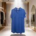 Front view of cobalt blue drop shoulder button-up shirt dress with chest pockets and relaxed fit