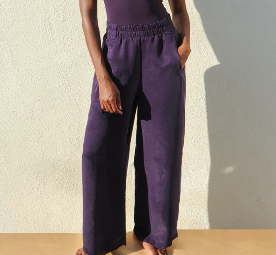 Purple wide-leg day trip pants with elastic waistband and relaxed fit