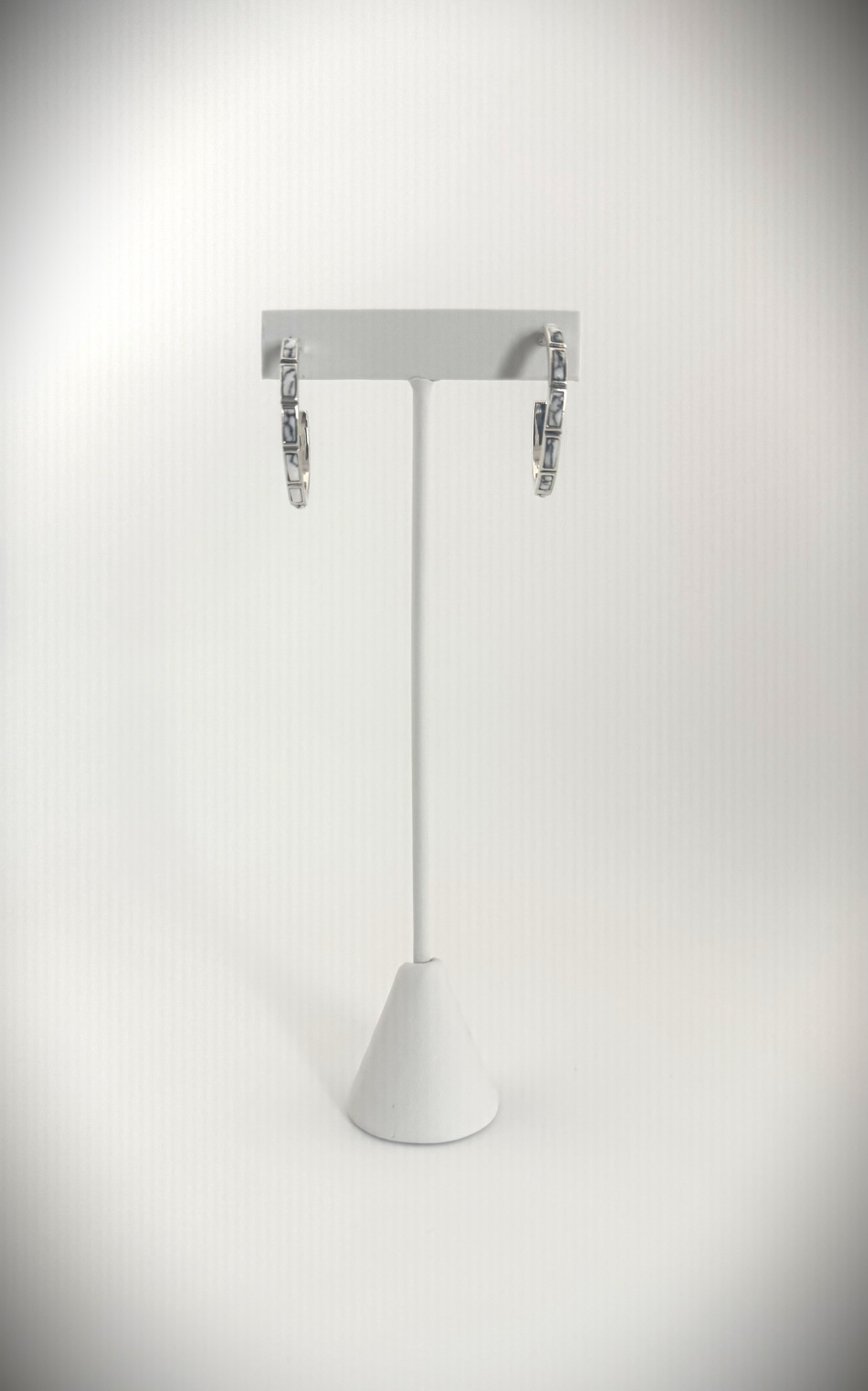 Sterling Silver Howlite earings on stand